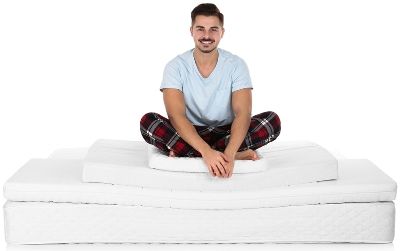 Chico sobre colchones de diferentres espesores